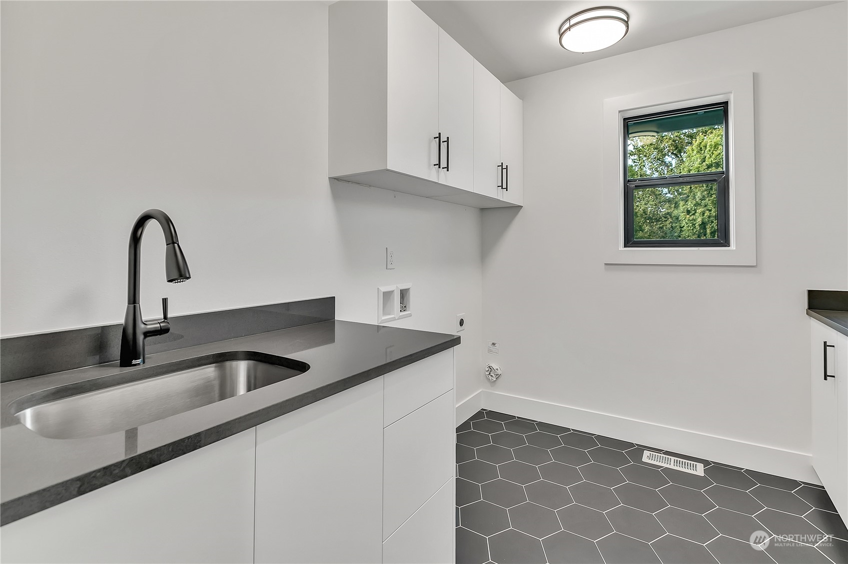 5425 Parker Road East Sumner, WA 98390 - Photo 36 of 40 a close view of sink and tap