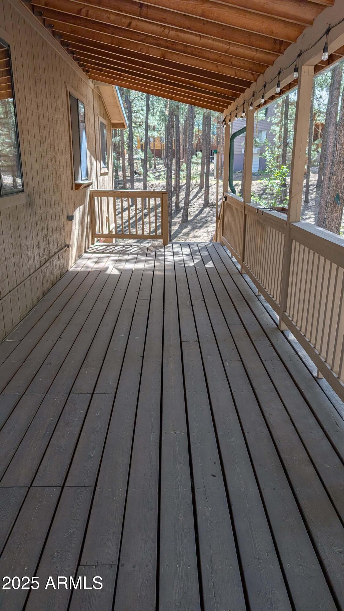 2425 Tall Trees Loop Forest Lakes, AZ 85931 - Photo 33 of 43 a view of balcony with wooden floor
