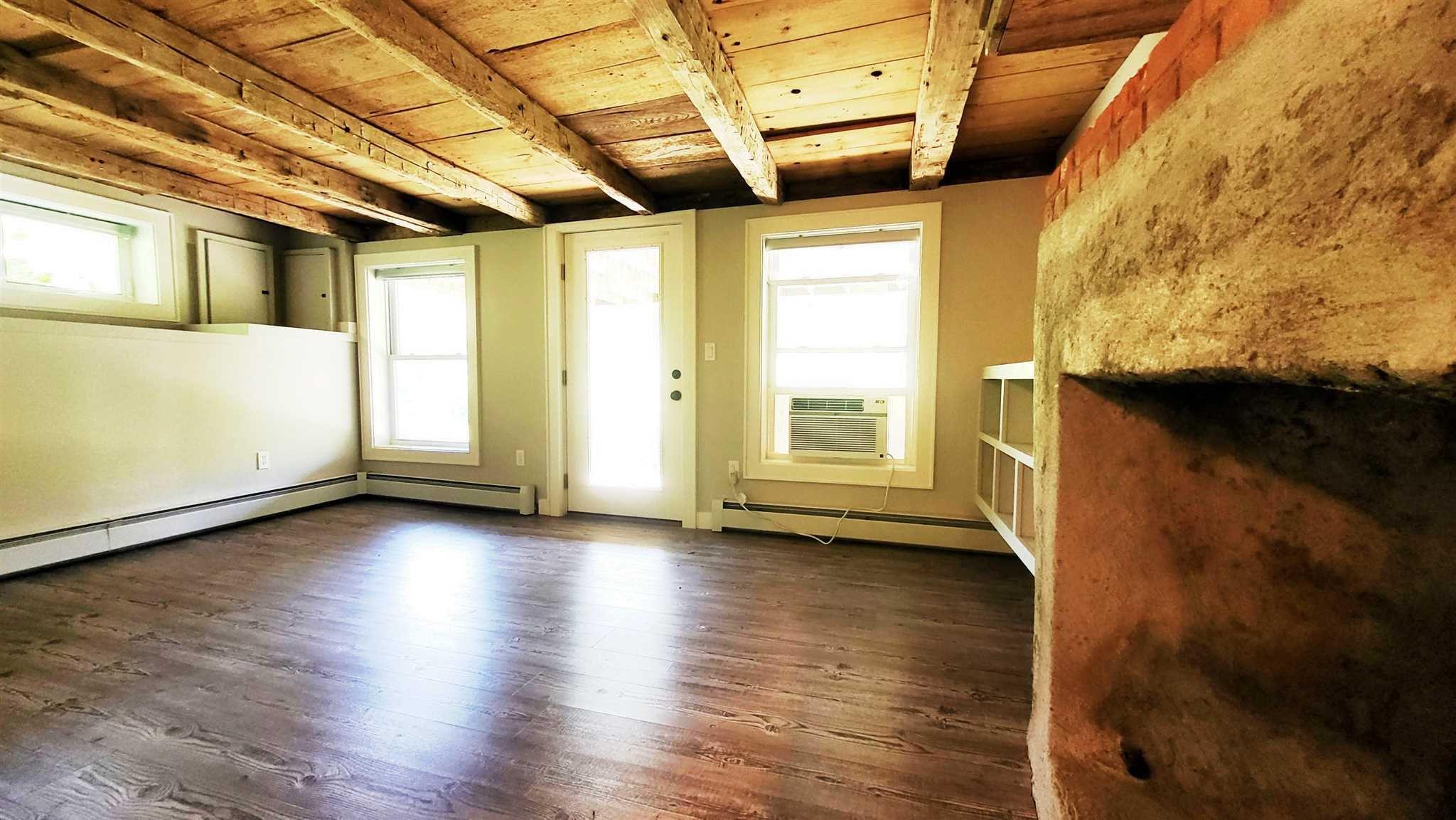 7 Looking Rocks Lane Hopewell Junction, NY 12533 - Photo 16 of 22 a view of empty room with wooden floor and fan
