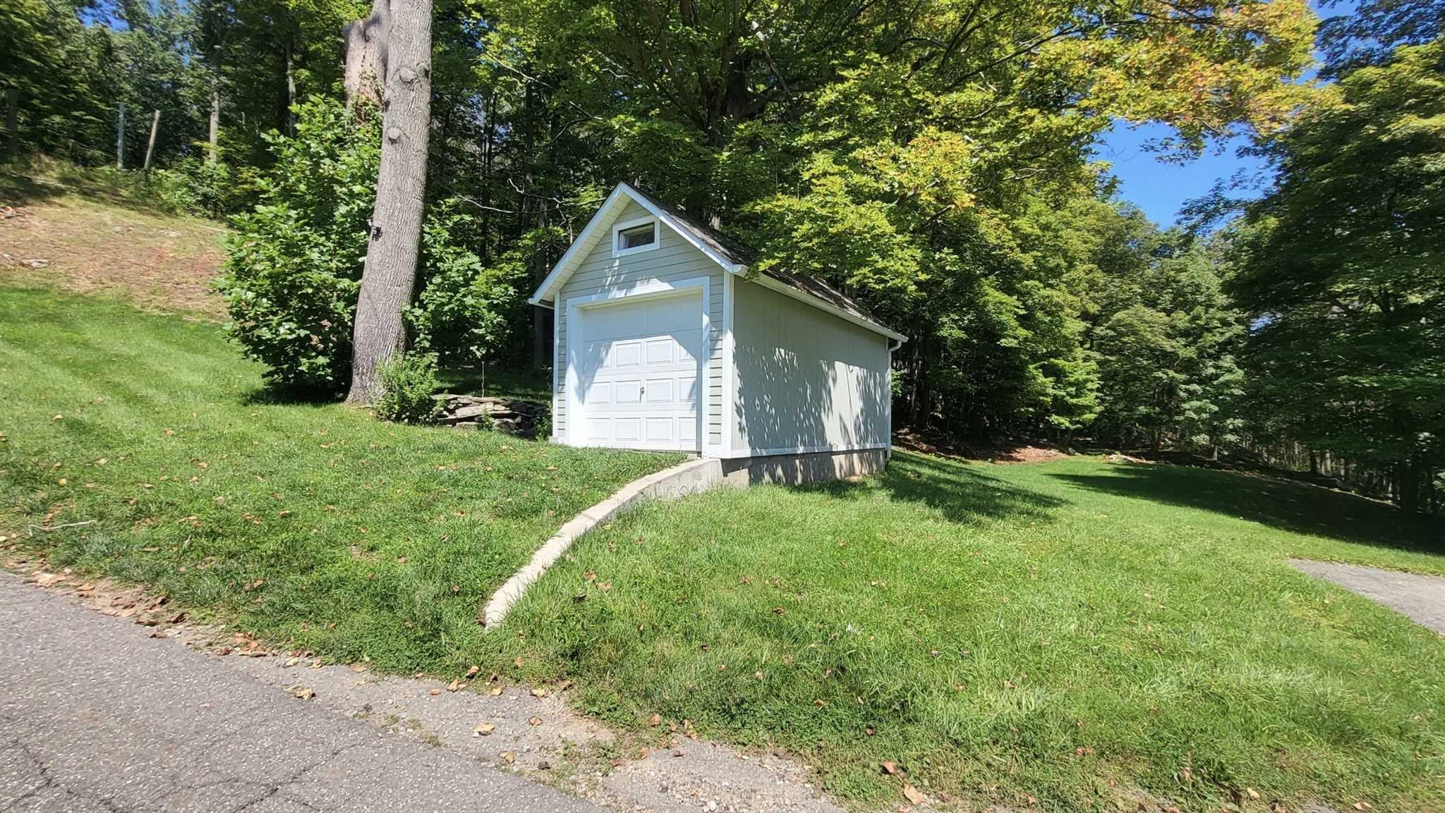 7 Looking Rocks Lane Hopewell Junction, NY 12533 - Photo 4 of 22 a front view of a house with garden