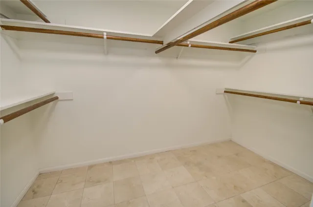 a view of a room with racks on the wall