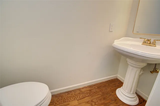 a bathroom with a sink and a toilet