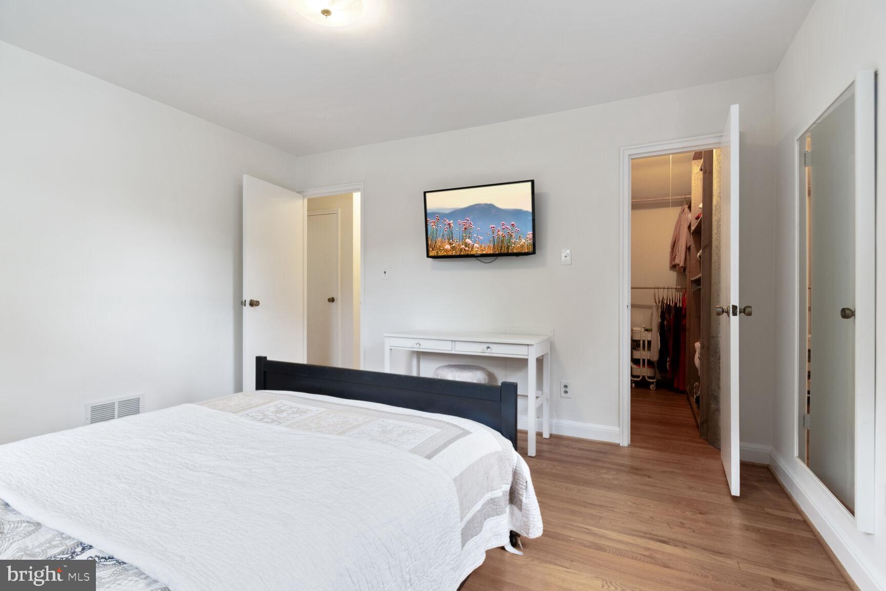 8504 Grubb Road Chevy Chase, MD 20815 - Photo 11 of 29 a bedroom with a bed and a tv