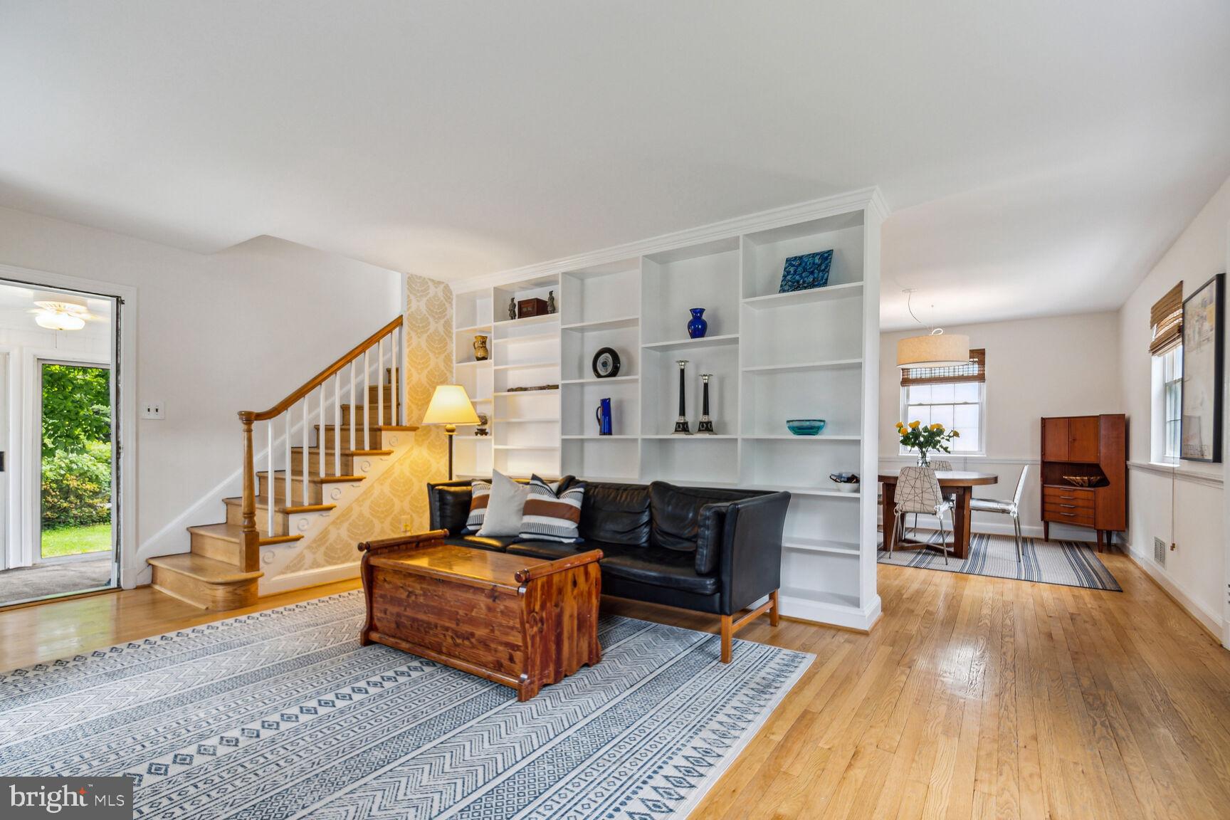 8504 Grubb Road Chevy Chase, MD 20815 - Photo 5 of 29 a living room with furniture and a wooden floor