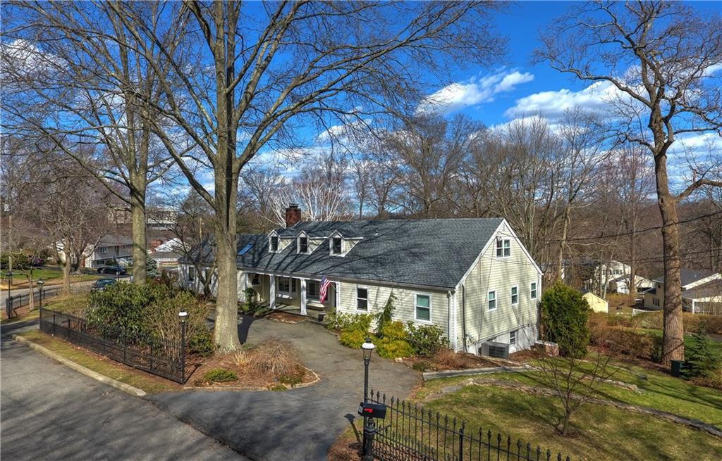 40 Pine Ridge Road Fairfield, CT 06825 - Photo 1 of 1 a front view of a house with a yard