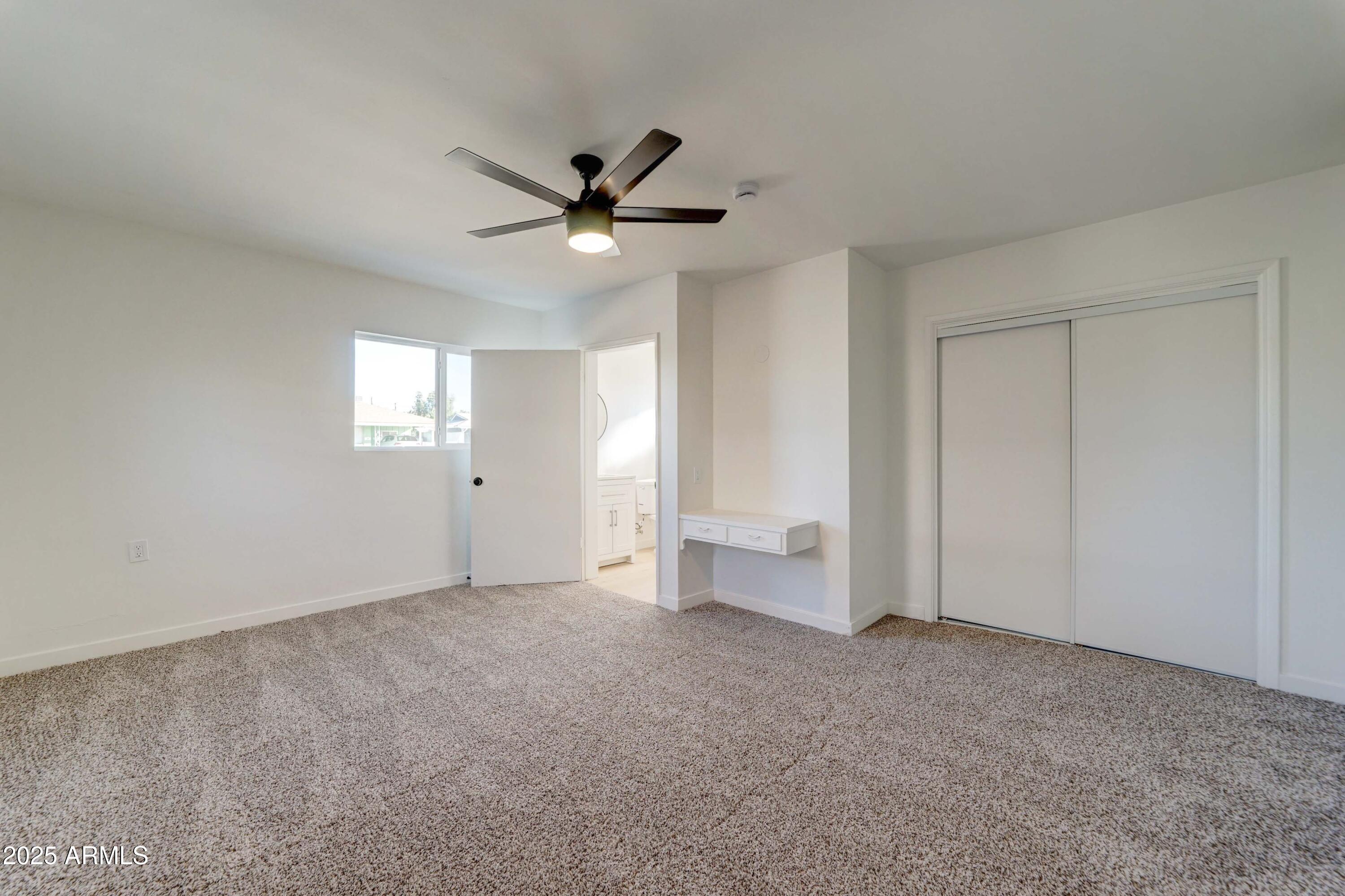 2039 West Northview Avenue Phoenix, AZ 85021 - Photo 16 of 30 a view of an empty room with a window