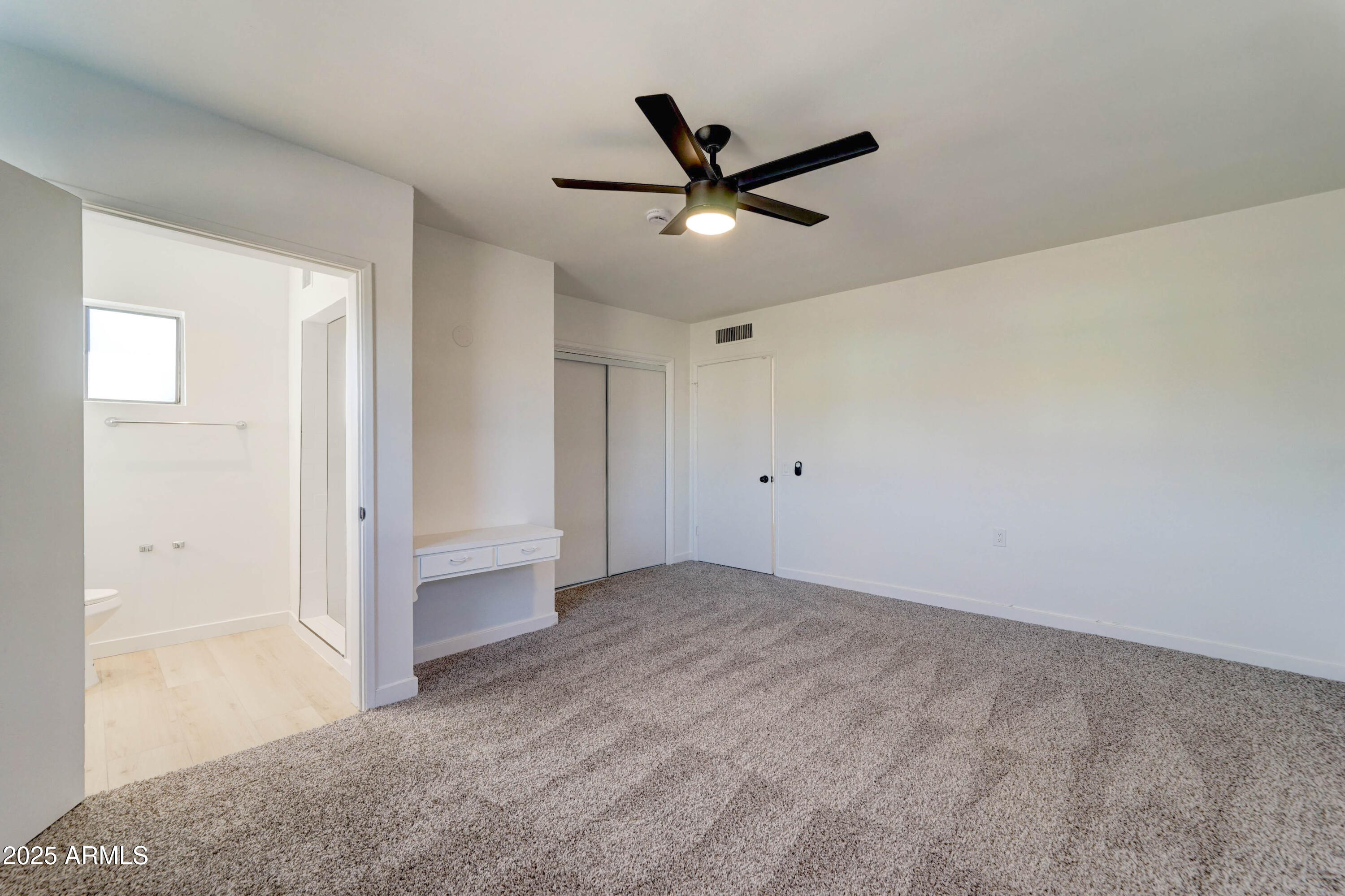 2039 West Northview Avenue Phoenix, AZ 85021 - Photo 17 of 30 a view of a big room with wooden floor and windows