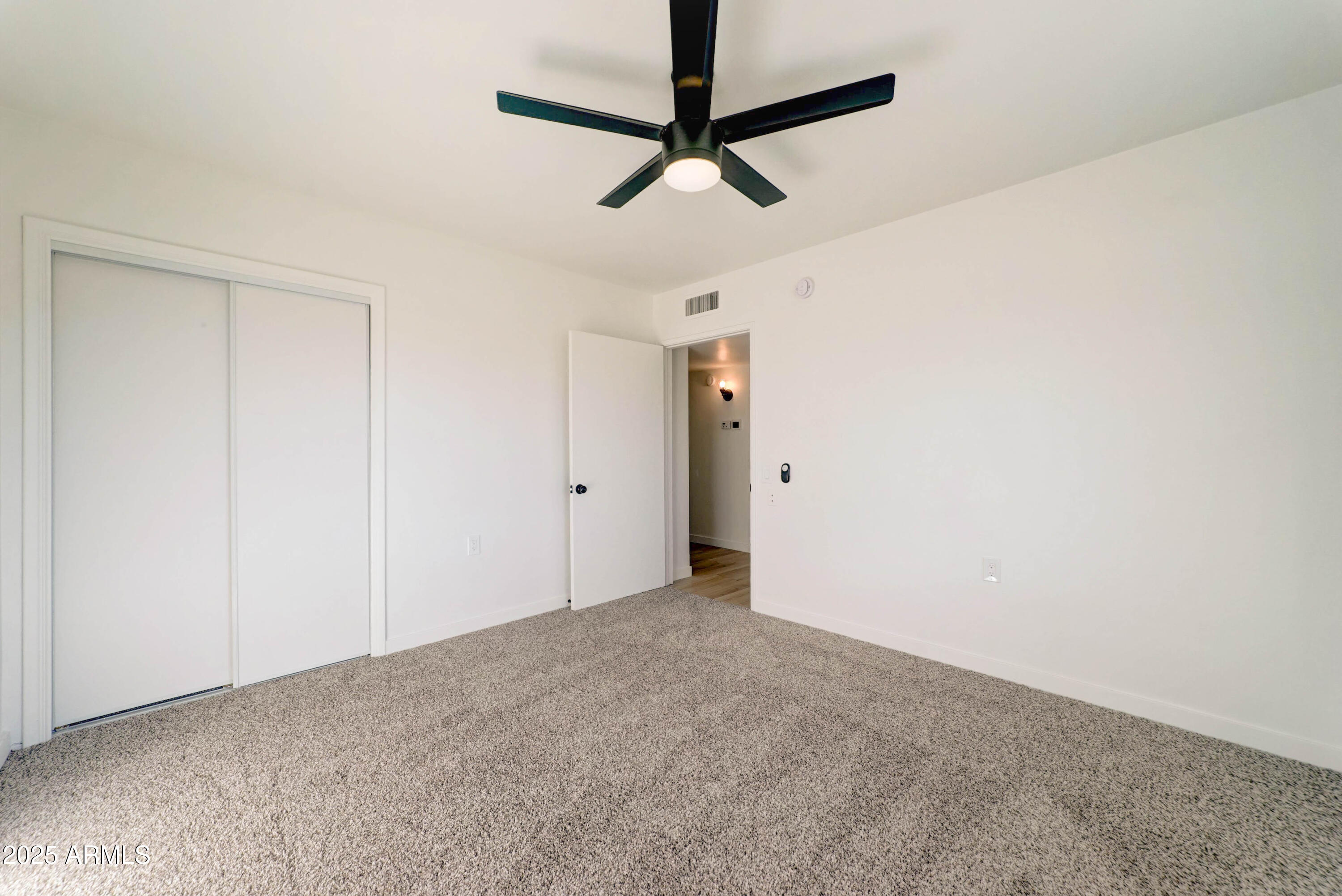2039 West Northview Avenue Phoenix, AZ 85021 - Photo 23 of 30 a view of a room with a ceiling fan
