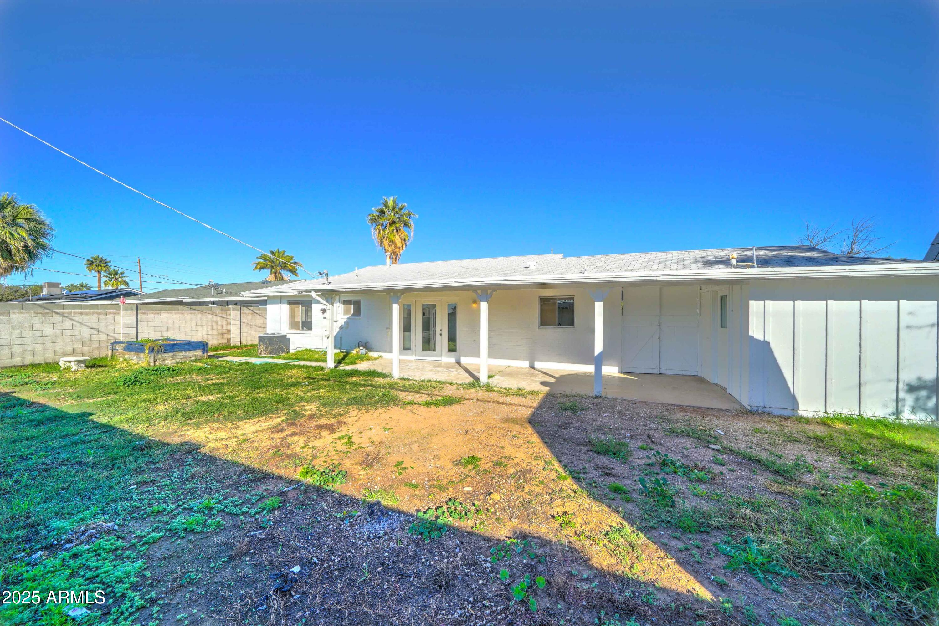 2039 West Northview Avenue Phoenix, AZ 85021 - Photo 29 of 30 a view of a house with backyard and sitting area