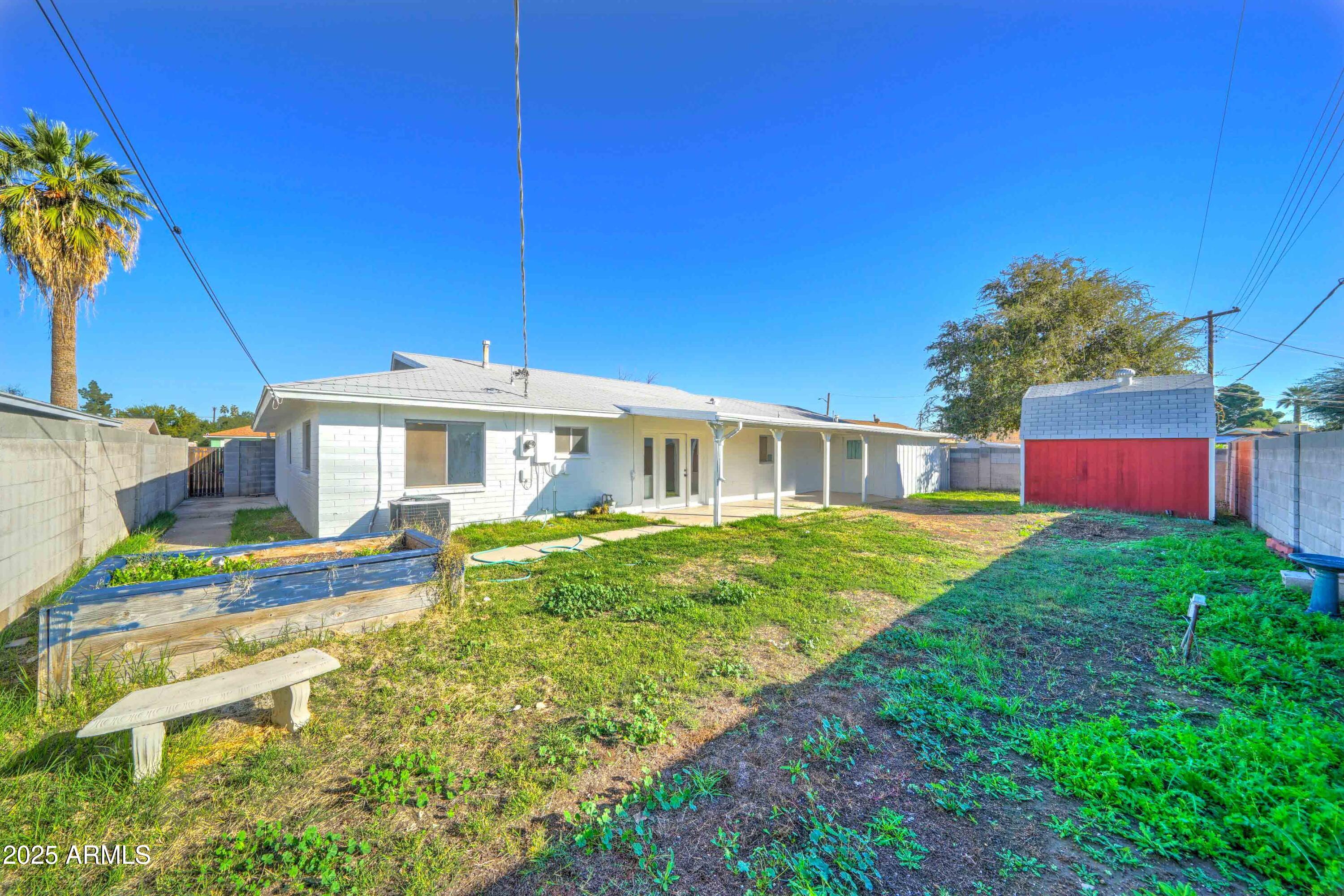 2039 West Northview Avenue Phoenix, AZ 85021 - Photo 30 of 30 a front view of house with yard and outdoor seating