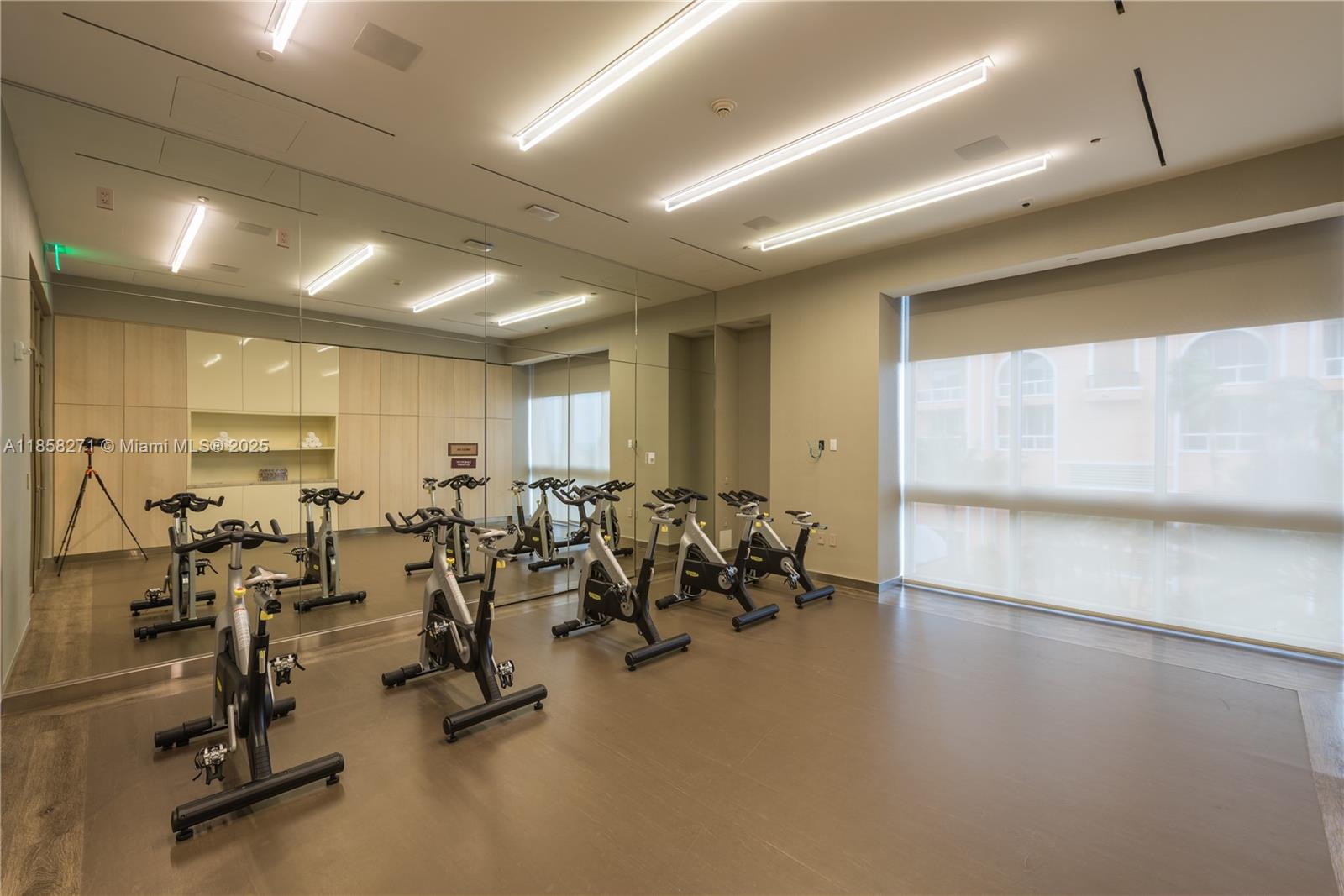 17749 Collins Avenue, Unit 802 Sunny Isles Beach, FL 33160 - Photo 13 of 25 a view of a room with gym equipment