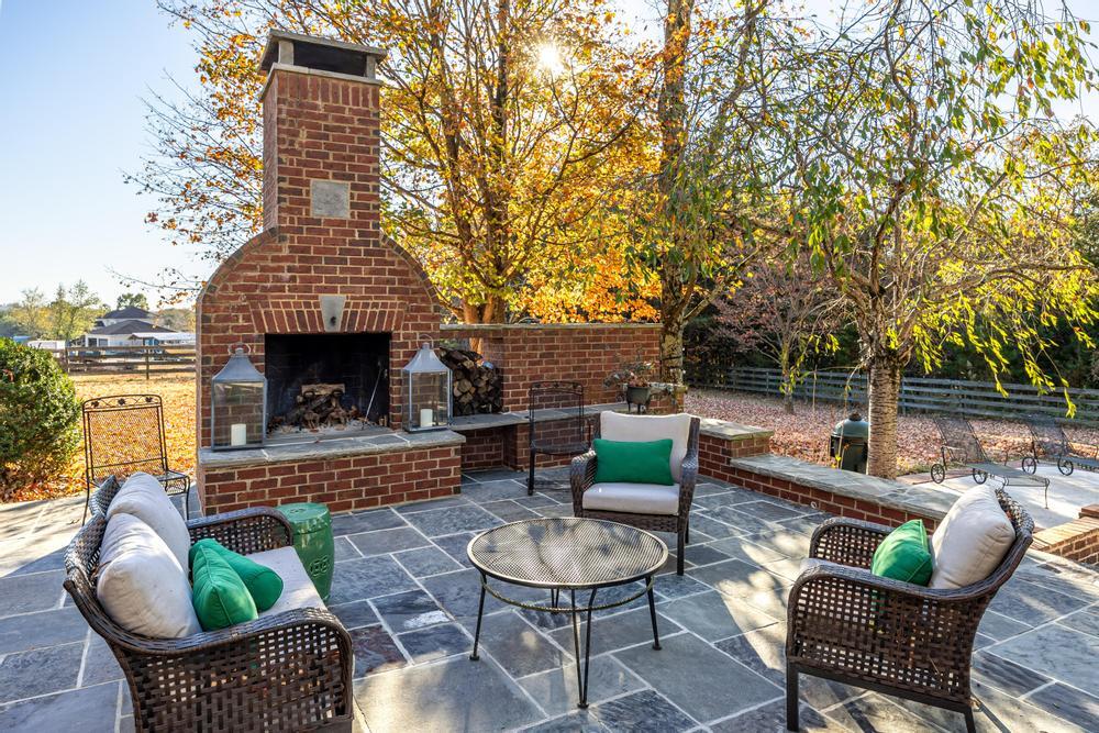 345 Morgan Road Charleston, TN 37310 - Photo 10 of 69 Upper patio with fireplace