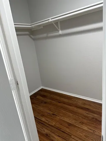 a view of an empty walk in closet