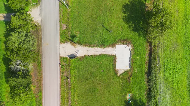 a view of swimming pool from a yard