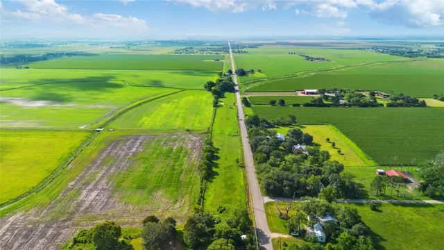 a view of a golf course with a building