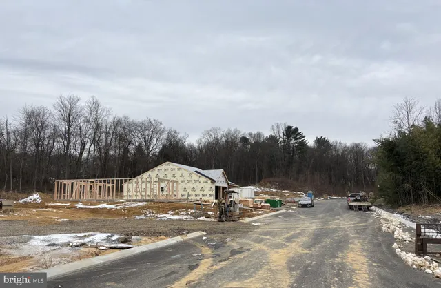 a view of a road with a yard