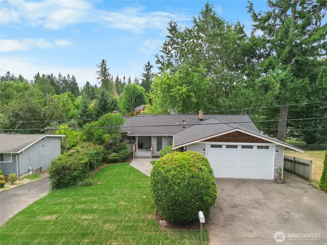 a roof deck view with a bench
