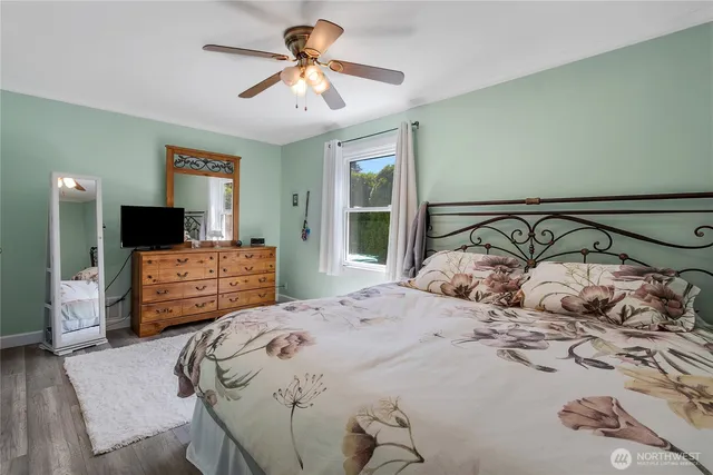 a bedroom with a bed and furniture