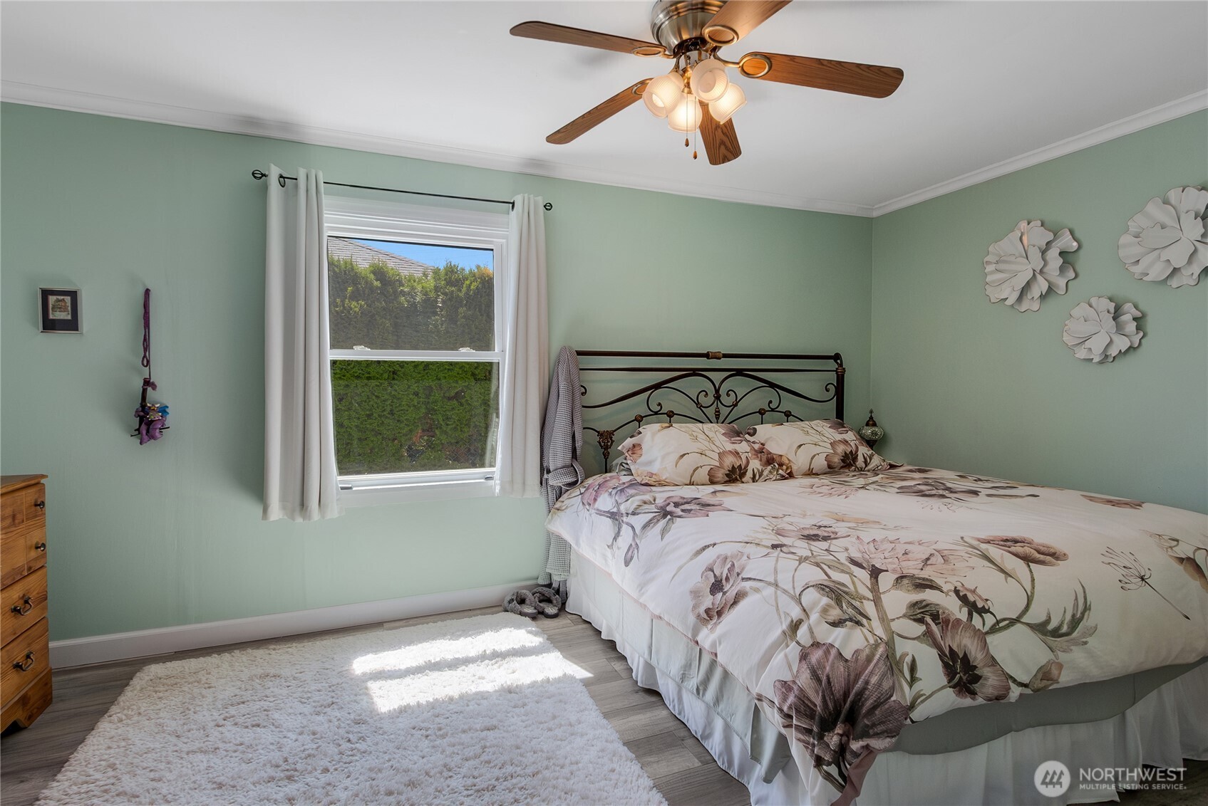 223 R Street Southeast Auburn, WA 98002 - Photo 15 of 23 a bedroom with a bed and a window