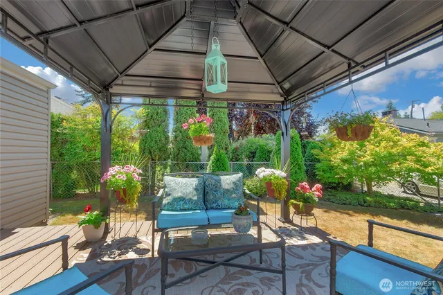 a outdoor living space with furniture and garden view