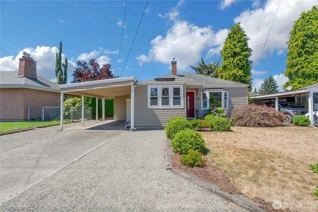 front view of a house with a yard