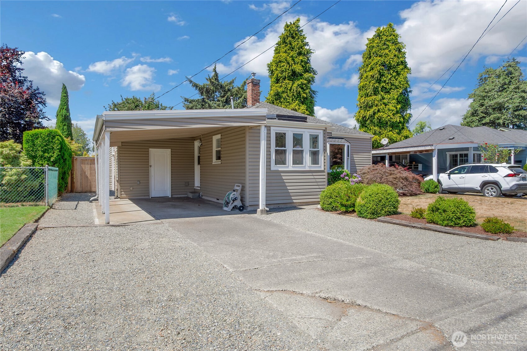 223 R Street Southeast Auburn, WA 98002 - Photo 3 of 23 front view of house with a yard