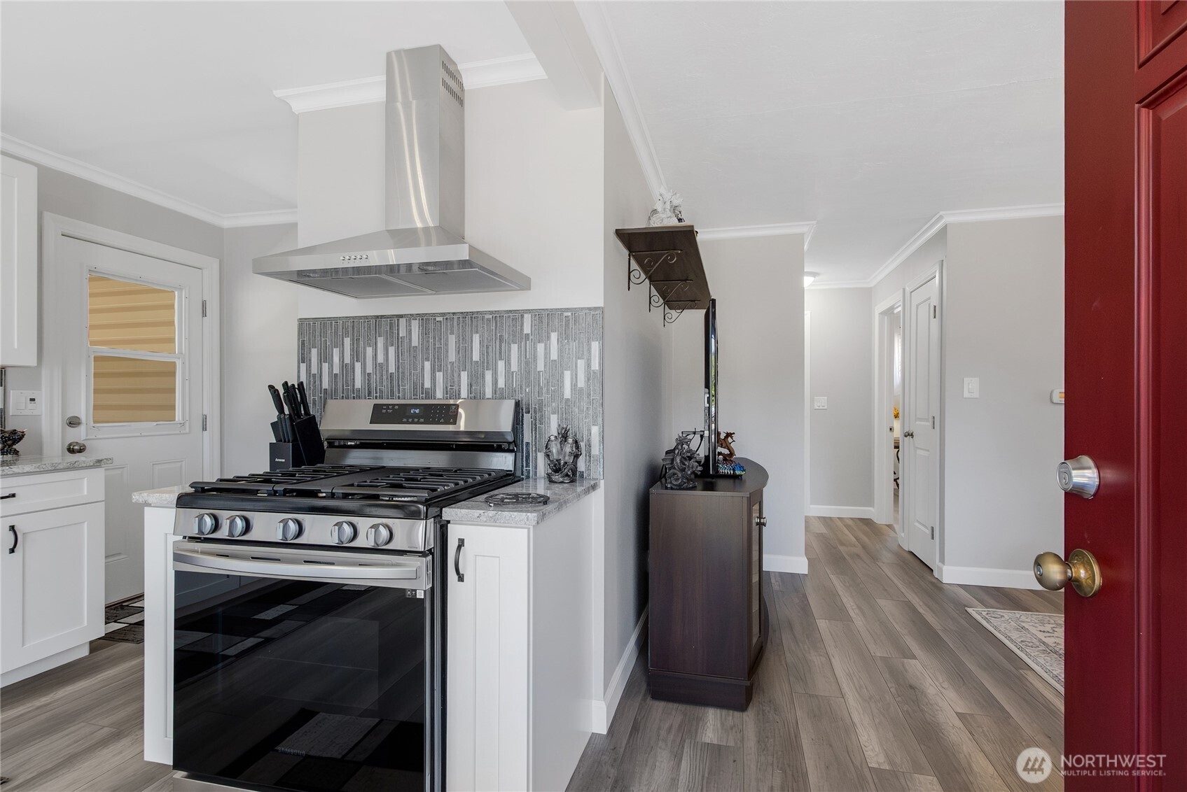 223 R Street Southeast Auburn, WA 98002 - Photo 6 of 23 a kitchen with a stove and a refrigerator