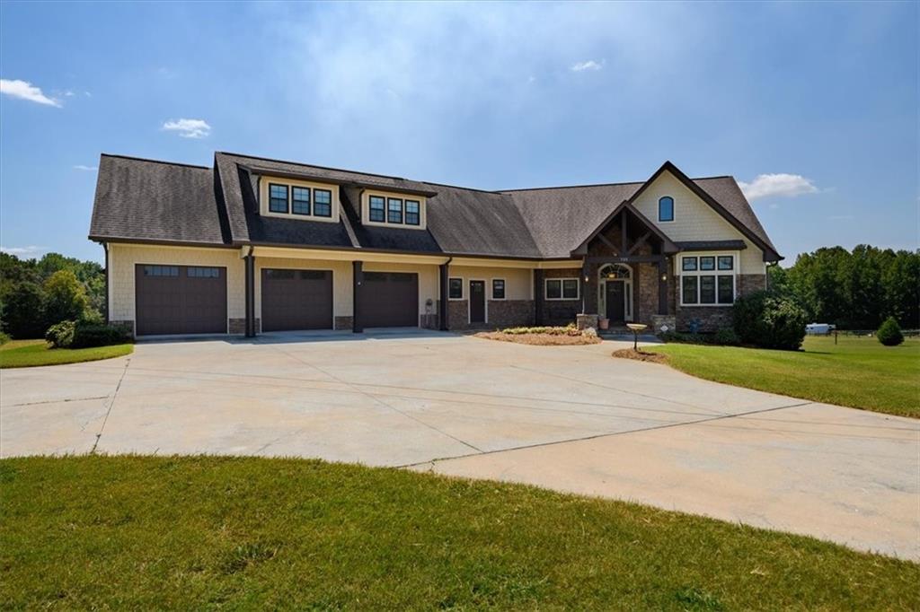 a front view of a house with yard