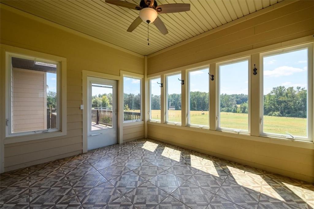 725 County Farm Road Jefferson, GA 30549 - Photo 14 of 43 a large room with a large window