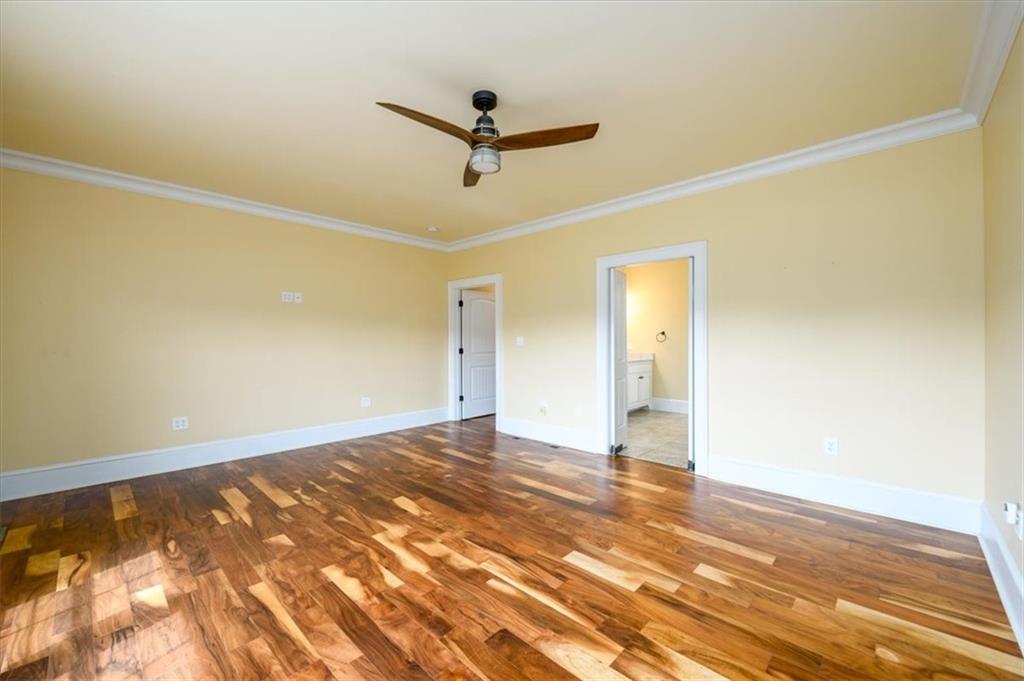 725 County Farm Road Jefferson, GA 30549 - Photo 21 of 43 a view of a big room with wooden floor and windows