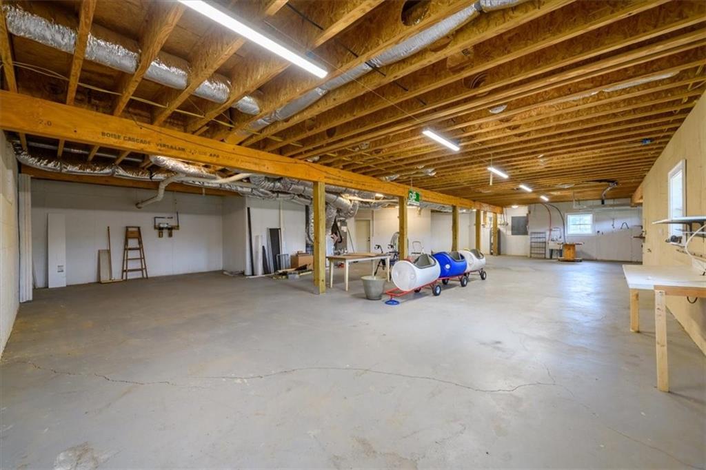 725 County Farm Road Jefferson, GA 30549 - Photo 30 of 43 a view of a room with wooden ceiling