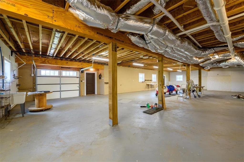 725 County Farm Road Jefferson, GA 30549 - Photo 31 of 43 a view of parking garage with windows