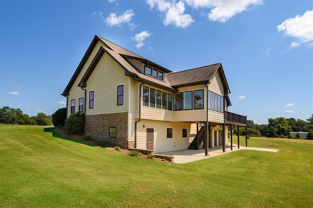 725 County Farm Road Jefferson, GA 30549 - Photo 33 of 43 a view of a house with a big yard