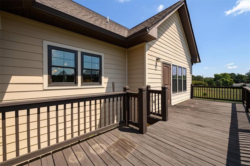 725 County Farm Road Jefferson, GA 30549 - Photo 36 of 43 a view of a balcony with wooden floor