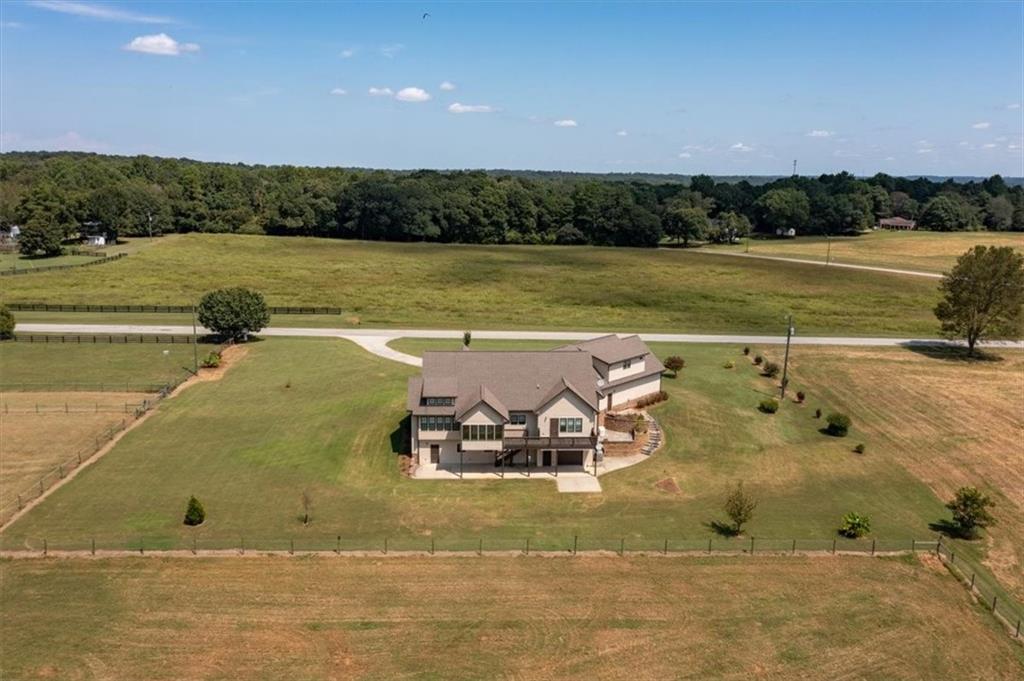 725 County Farm Road Jefferson, GA 30549 - Photo 40 of 43 a view of a swimming pool and lake
