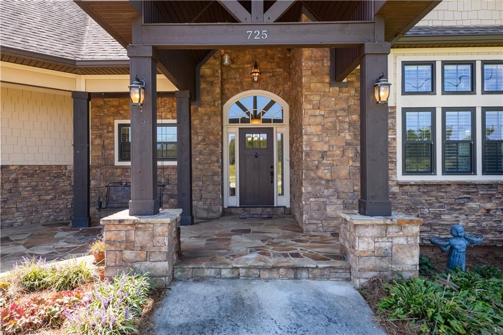 725 County Farm Road Jefferson, GA 30549 - Photo 4 of 43 a front view of a house with a yard