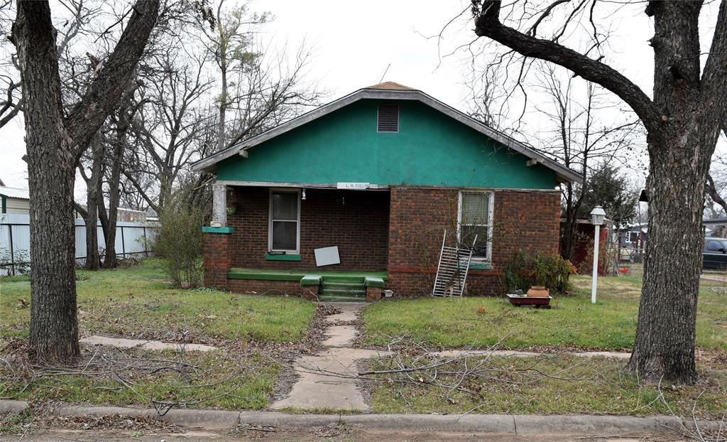 415 West 12th Street Coleman, TX 76834 - Photo 1 of 7 a view of a house with a yard