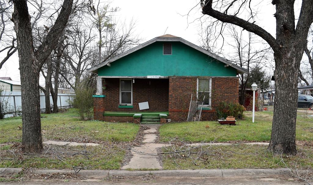 415 West 12th Street Coleman, TX 76834 - Photo 2 of 7 a view of a house with a yard