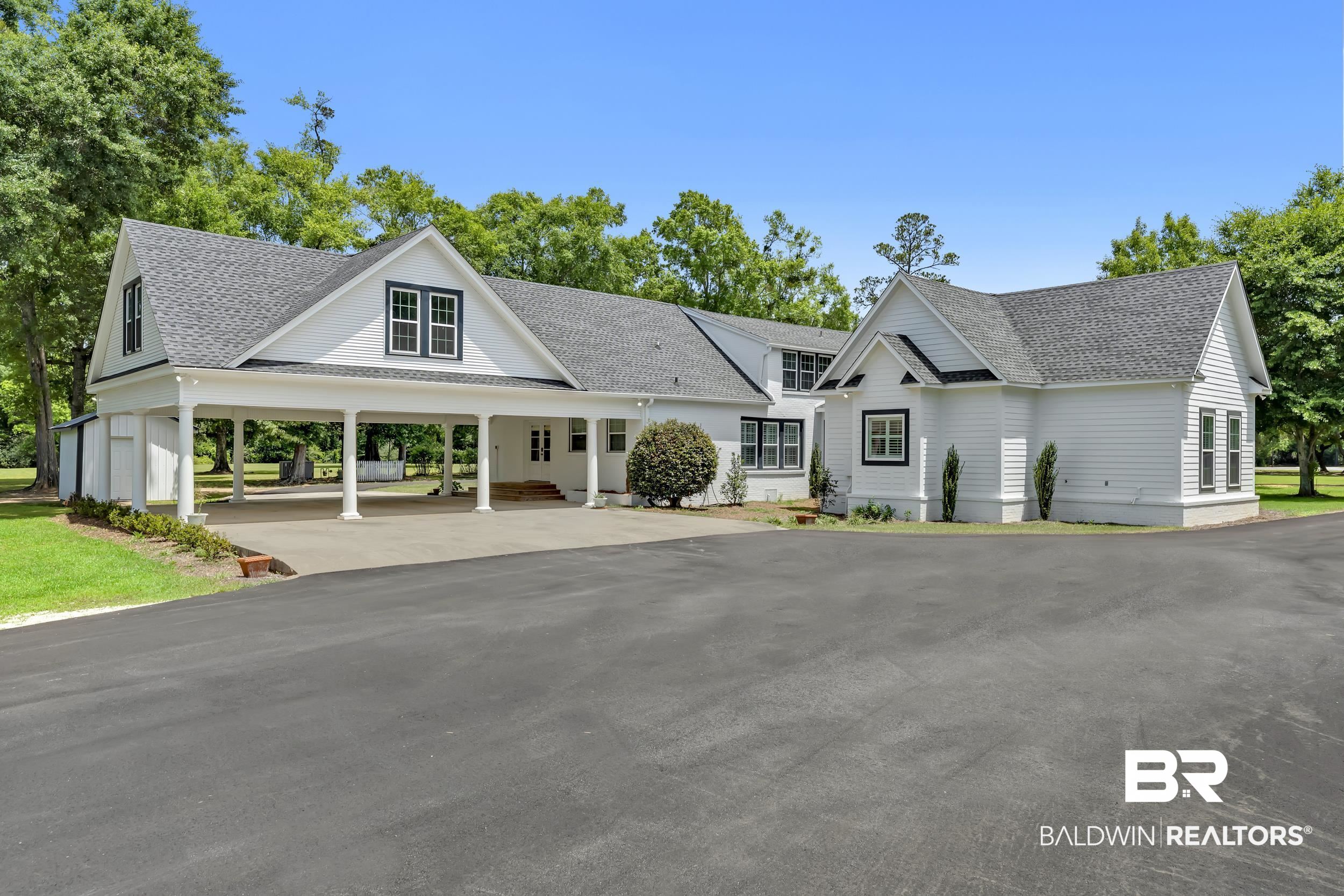 43199 Pine Grove Road Bay Minette, AL 36507 - Photo 4 of 71 White exterior with dark trim windows