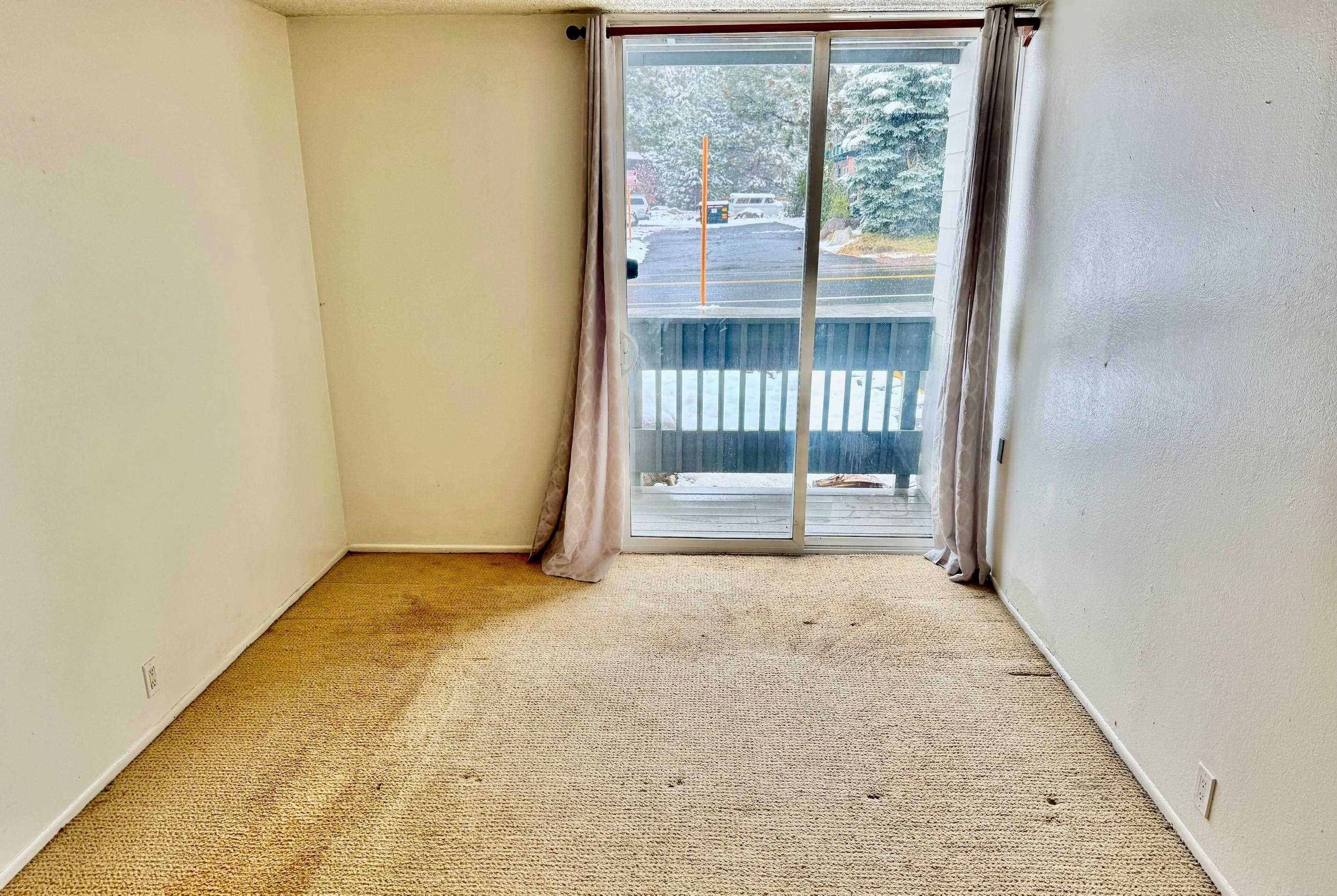 137 Laurel Mountain Road, Unit 302 Mammoth Lakes, CA 93546 - Photo 5 of 12 a view of an empty room with a window