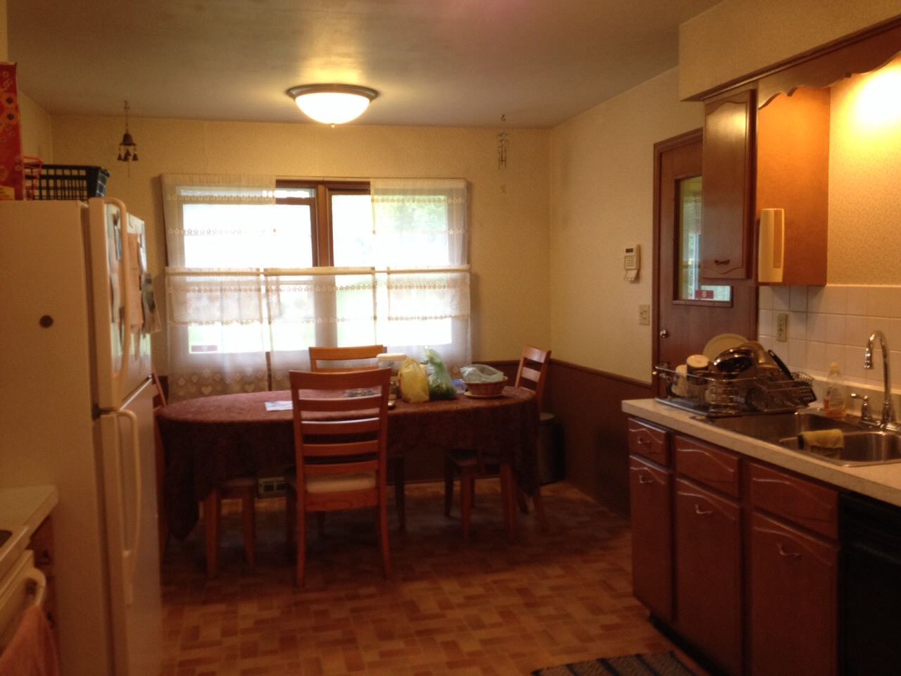 5206 Brookview Road Rockford, IL 61107 - Photo 11 of 23 a view of a dining room with furniture and window