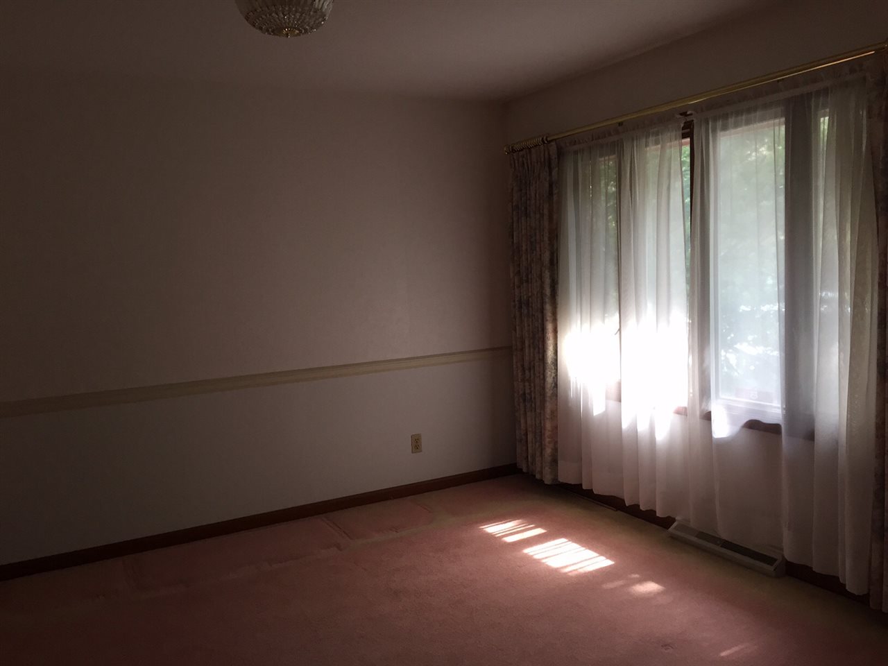 5206 Brookview Road Rockford, IL 61107 - Photo 12 of 23 an empty room with windows