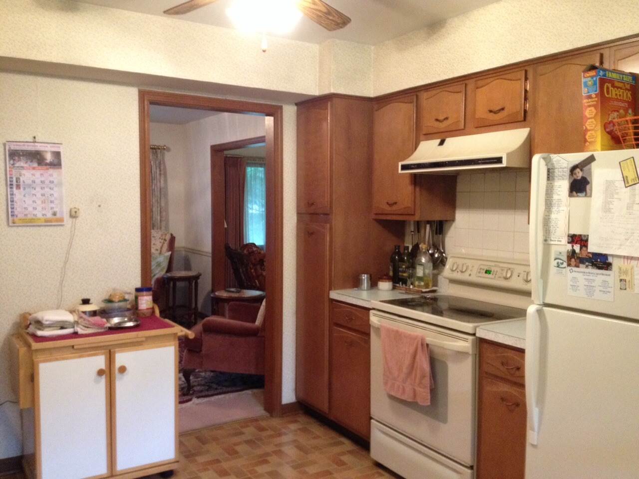 5206 Brookview Road Rockford, IL 61107 - Photo 6 of 23 a kitchen with a stove and a sink