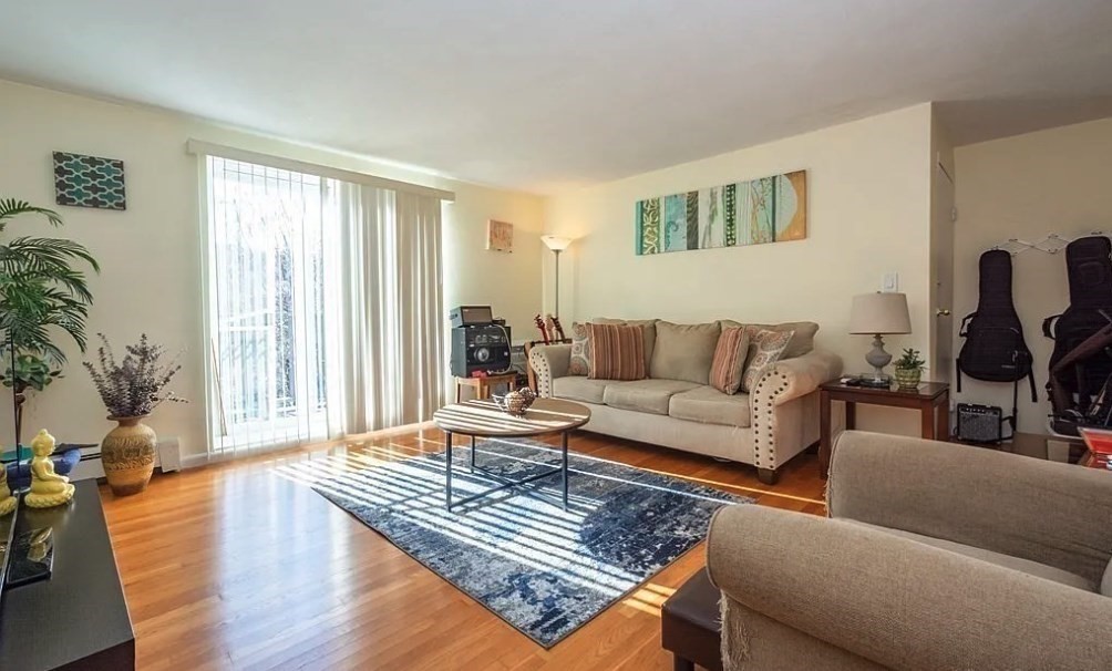 40 Westgate Road, Unit 5 Chestnut Hill, MA 02467 - Photo 11 of 33 a living room with furniture and a wooden floor