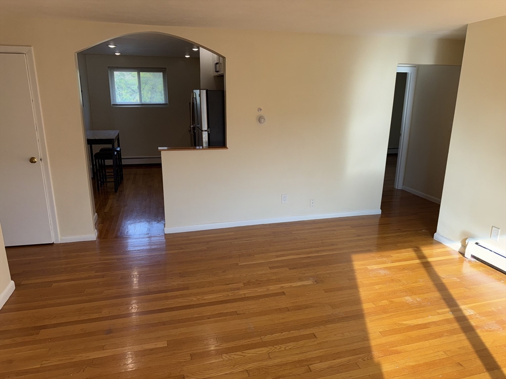 40 Westgate Road, Unit 5 Chestnut Hill, MA 02467 - Photo 12 of 33 a view of a living room with a wooden floor