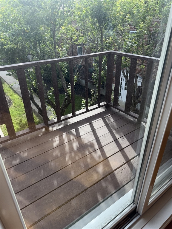 40 Westgate Road, Unit 5 Chestnut Hill, MA 02467 - Photo 15 of 33 a view of a balcony with an outdoor space