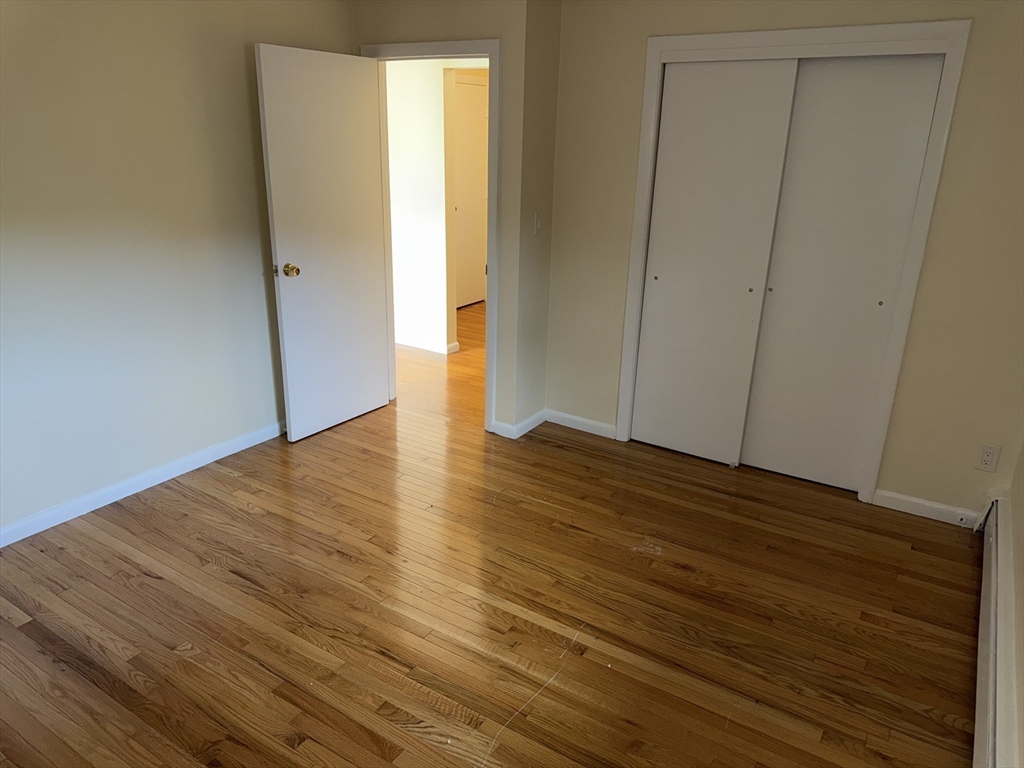 40 Westgate Road, Unit 5 Chestnut Hill, MA 02467 - Photo 18 of 33 a view of a room with wooden floor
