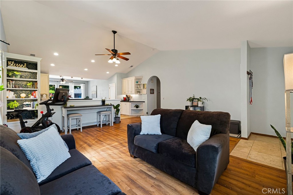 13 Avante Way Chico, CA 95973 - Photo 11 of 58 a living room with furniture kitchen view and a chandelier