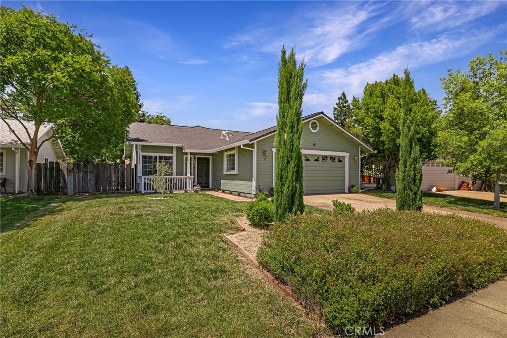 13 Avante Way Chico, CA 95973 - Photo 2 of 58 a front view of a house with a yard