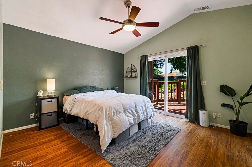 13 Avante Way Chico, CA 95973 - Photo 23 of 58 a bed sitting in a bedroom next to a window